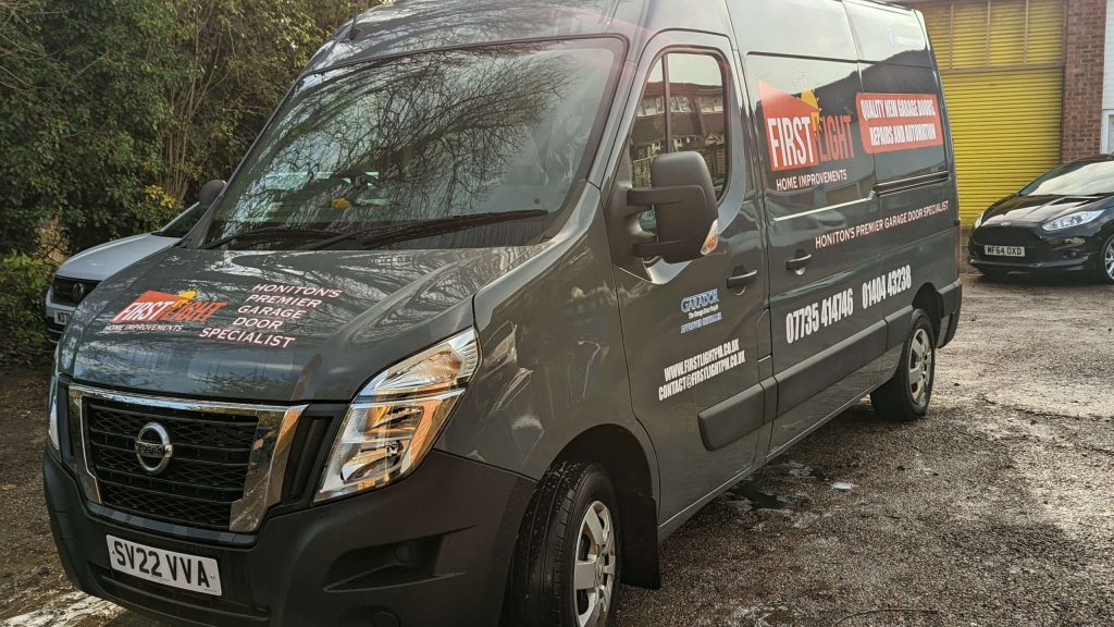 Front view of first light home improvements van